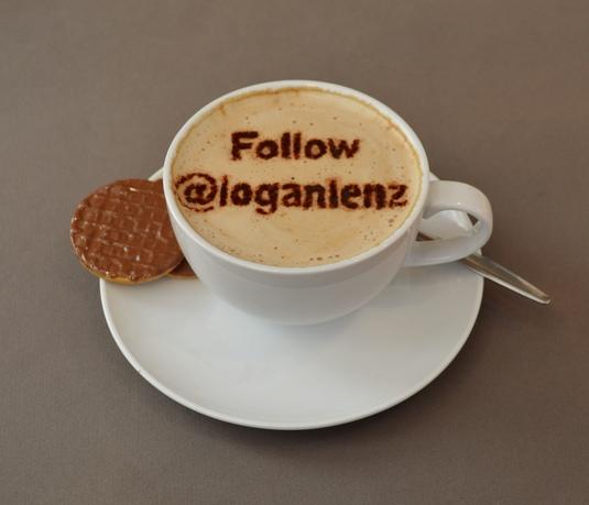 write a short message in the froth of a cup of cappuc...